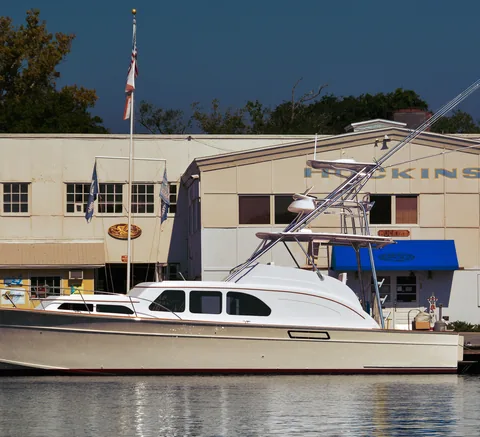 Sportfishing yacht moored in front of the Huckins yard