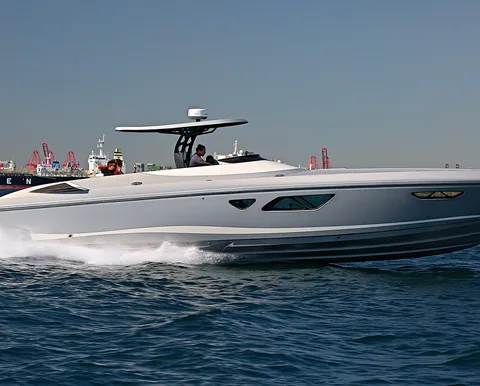 Center console yacht running in open water